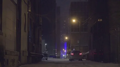Car parked with tail lights on in a dark winter alley 스톡 동영상 85401269