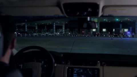 Car parked at toll gate intersection Stock Footage 235276461