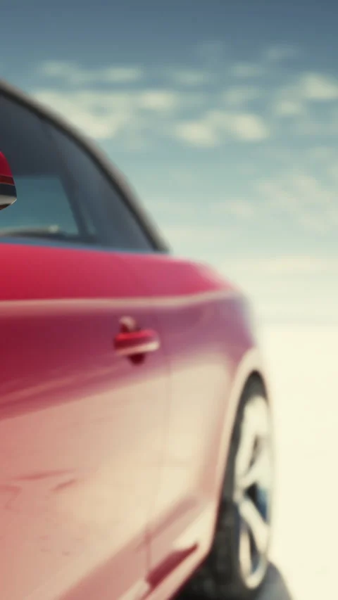 Car parked on a white salt flat under blue sky with clouds at mid day Stock Footage 337969292