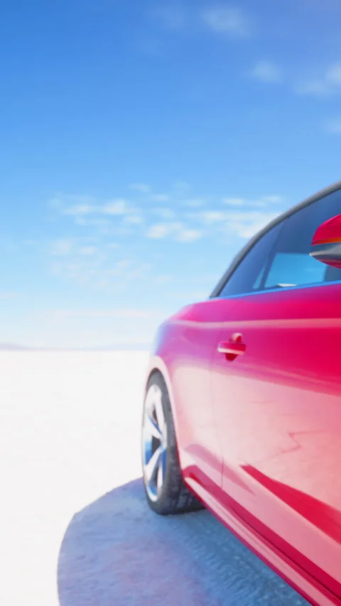 Car parked on white salt flat under blue sky with clouds Stock Footage 337976294