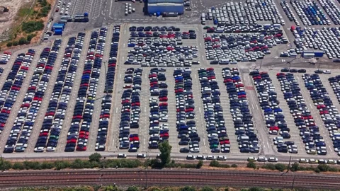Car parking area viewed from above with many vehicles and plants Stock Footage 341330801