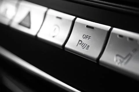 Car parking assist button inside luxury car interior close-up view photo Stock Photos