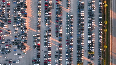 Car parking lot with diverse selection of vehicles for sale, including electric Stock Footage 335780460