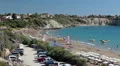Car parking of popular Coral Bay beach in Peyia town, Paphos district, Cyprus HD Footage