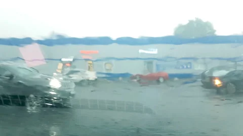Car parking in the rain Stock Footage 134416958