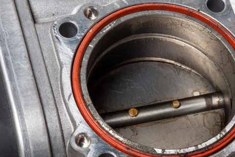 Car part engine throttle valve opened by the gas pedal to supply more air to  Stock Photos