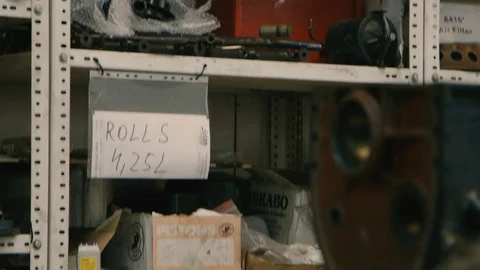 Car Parts in the Workshop. Camera Moving Up Stock Footage 73490447