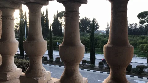 Car Pass Under a Classic Floor Balcony in Nicosia Stock Footage 101794473