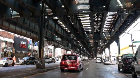 Car Passes Below Dark Empty Brighton Beach Subway Line Stock Footage 129580427