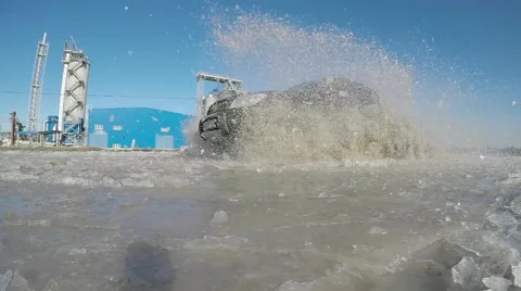 Car passes close to the camera. Winter sunny day. The beautiful clear blue sky. Stock-Footage 59991421