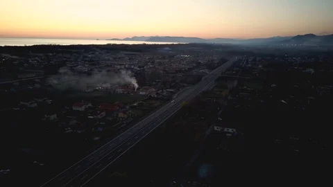 A car passes on a deserted highway Stock Footage 126406599
