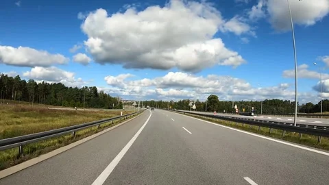 A car passes under a bridge at high speed Stock Footage 310678293