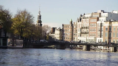 Car passing the bridge on the river Stock Footage 71535919