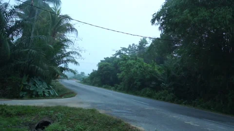 A Car Passing By On Cornering Road In Quiet Rural Area Stock Footage 34731182