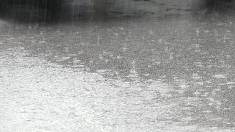 Car passing by fast in heavy rain. Dangerous slippery road Stock Footage 140031333