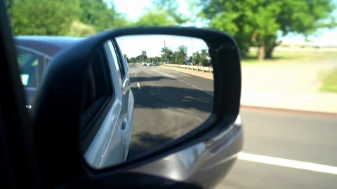 Car passing by Stock Footage 93947885