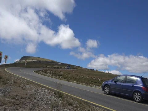 Car passing in high mountain road Transalpina at summer speed motion Video stock 70960439