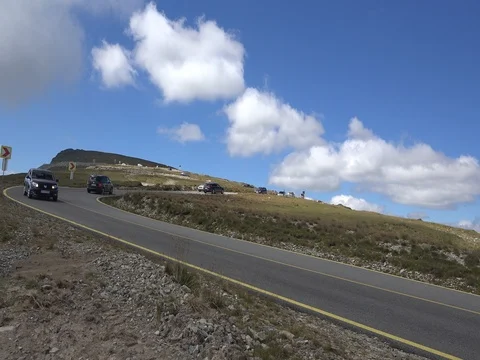 Car passing in high mountain road Transalpina at summer speed motion Video stock 70960614