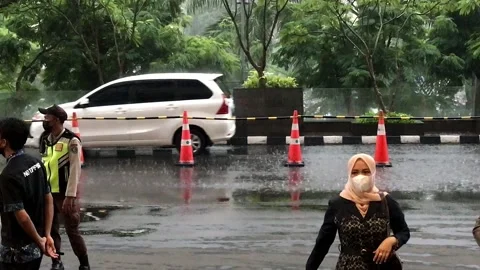 Car passing in the lobby of the building when it rains Stock Footage 171147694