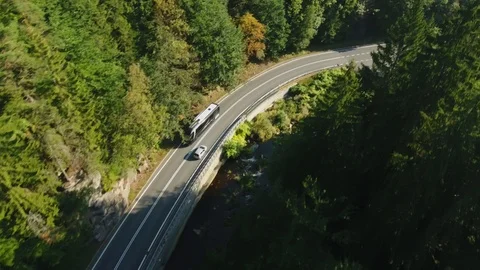 Car Passing Mountaing And Forest Scenery. Aerial View. Flying Between Trees Stock Footage 116671734