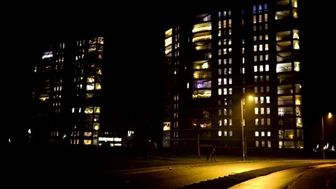 Car passing by at night Stock Footage 145156846