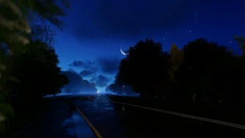 Car passing by on a slippery road, front view, starry night and moon Stock-Footage 126978272