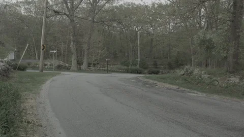 Car Passing By Suburban Field Stock Footage 90354284