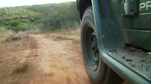 Car passing through grassland in ranch Stock Footage 54591391