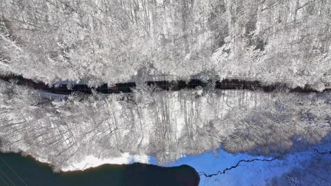 Car passing on the winter mountain road. Beautiful winter landscape Stock Footage 262567124