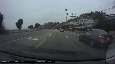 Car on PCH Collides with Wall at Highway Speed, Los Angeles, California, USA - 2 Stock Footage 205250235
