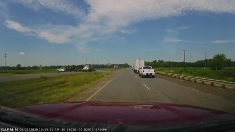 Car Picks the Wrong Time to Turn Across Highway, Louisiana, USA - 21 Aug 2020 Stock Footage 205149933
