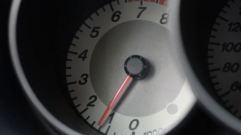 The car pics up speed, the load on the engine, tachometer Stock Footage 75913674