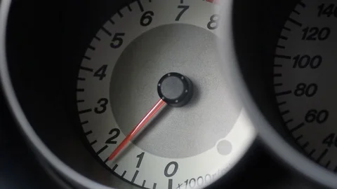 The car pics up speed, the load on the engine, tachometer Stock Footage 75913712