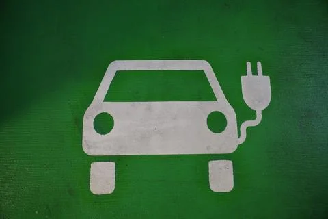 A car with a plug on the side of it Stock Photos