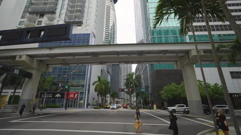 Car point of view driving in downtown Miami, Florida. Transportation and traffic Stock Footage 309149561