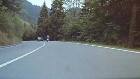 Car point of view driving on mountain road and almost hitting another car, Calif Stock Footage 163173378