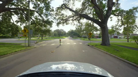 Car point of view driving in Venice, Florida. Transportation and traffic concept Stock Footage 332817028