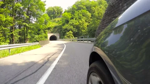 Car Point of View on Mountain Road and a Tunnel Stock Footage 135564456