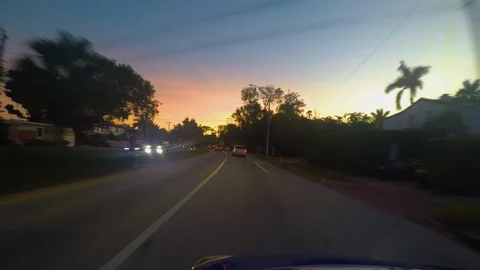 Car POV: Driving down streets into the suburbs just outside of downtown Miami Video stock 102403163