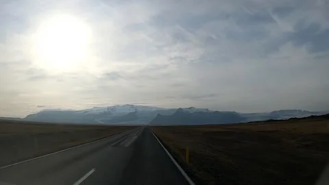 Car POV of the endless open road and ice cap in Iceland Stock Footage 334059191