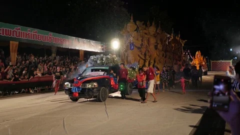 Car pulling candle car at parade,Ubon Ratchathani,Candle Festival,Thailand Stock Footage 81803744