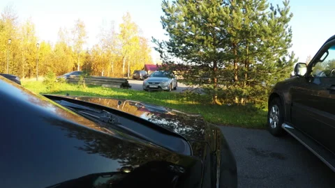 The car is pulling out the parking lot Stock Footage 106720644