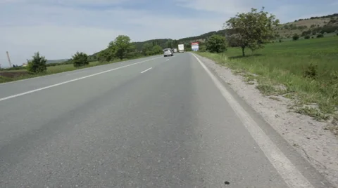 Car pulling u-turn off road Subjective point of view Video stock 63618530