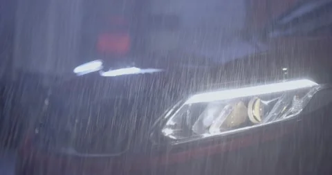 Car Pulls up in Pouring Rain Nightime.mp4 Stock Footage 196849469