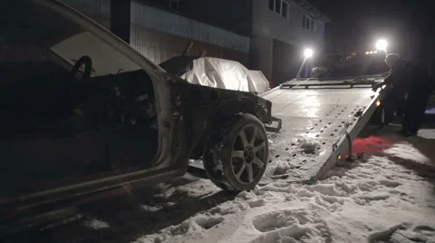 Car pulls into truck Stock Footage