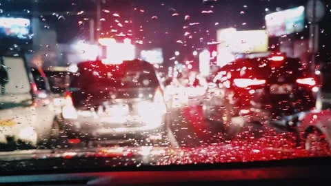 Car queue during rain. Traffic jam on the road. Stock Footage 296607276