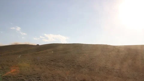 Car quickly rushes on the dusty road Stock Footage 80289986