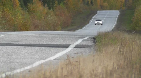 Car racing down the highway Stock Footage 30478858
