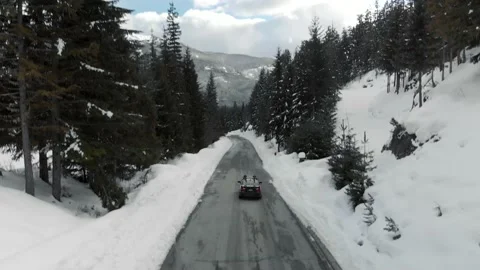 Car racing down winter road and forest with snow covered trees beautiful winter 스톡 동영상 149536129
