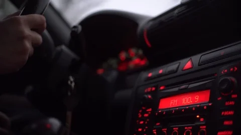 Car radio and speakers at night, ride in dark. Multi-colored neon lights buttons Stock Footage